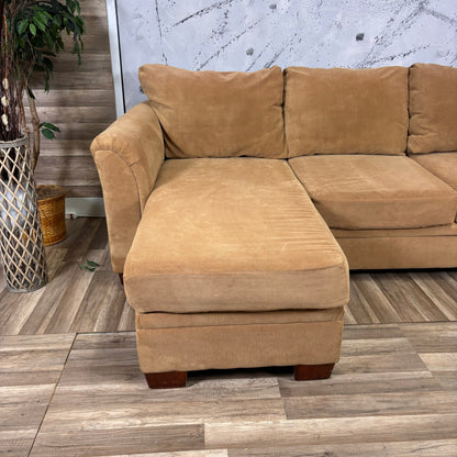 Brown Sectional With Reversible Chaise